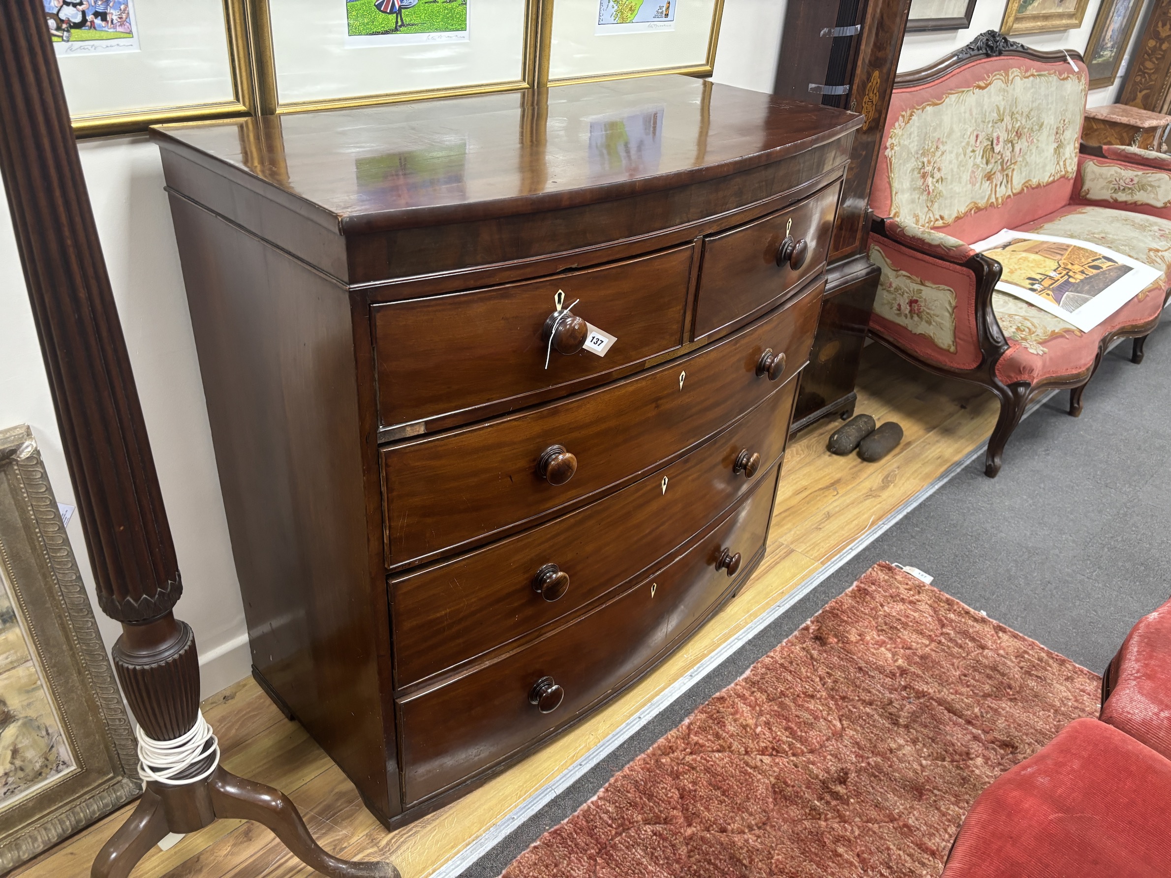 An early 19th century mahogany bowfront chest of drawers, with bone escutcheons, width 114cm, depth 55cm, height 107cm